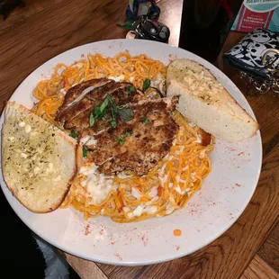 Cajun chicken Alfredo this shit right here it, is done, like a BOSS. Probably because it's made by the boss