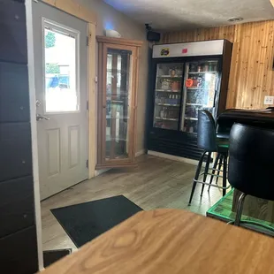 Entrance and to go cooler and dessert curio