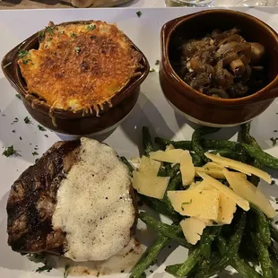 Filet with green beans, grits, and grilled mushrooms and onions