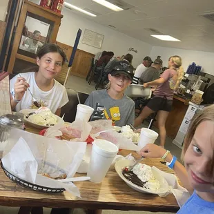Kids loving their hot fudge Sunday