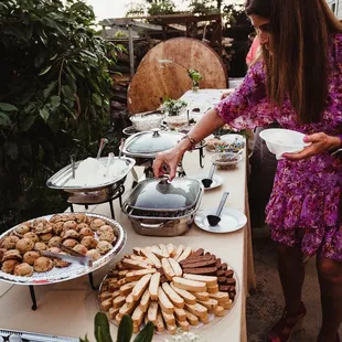 a woman serving food