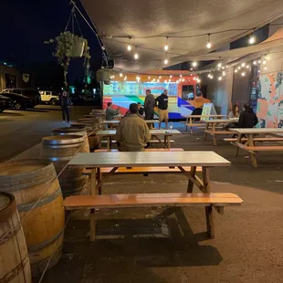 a man sitting at a picnic table