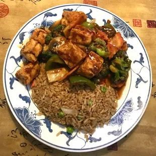 a plate of rice and vegetables