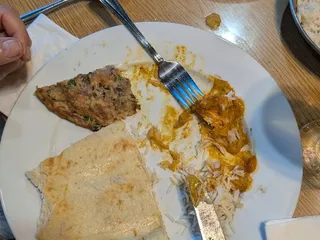 Bombay To Kathmandu Kitchen and Curry Pizza