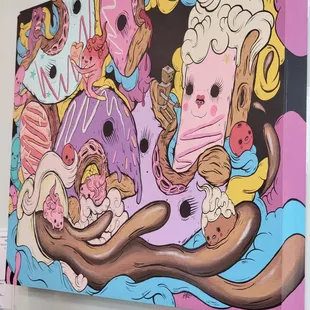 a large painting of a bunch of donuts