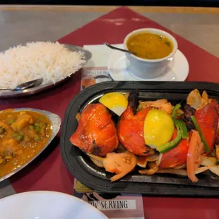 Dry chicken and bland curry. Small portions.