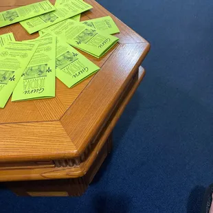 a table with a lot of yellow stickers on it