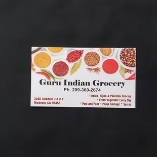 a business card on a black background