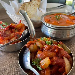Chili Chicken, Chicken Tikka Masala, and Vegetable Tikka Masala with Naan.