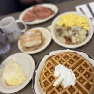 Waffles, eggs, toast, potatoes, country ham