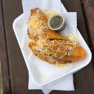Loaded chicken, rice, coconut, and cheese empanada