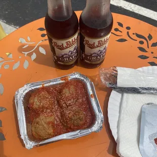 4 meatballs and 2 grape sodas