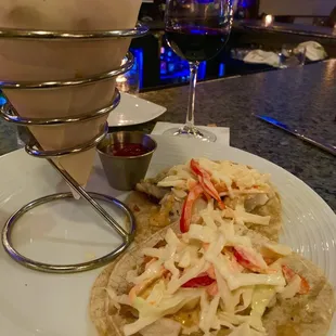 Fish tacos. Where is the pico or any sort of accompaniment like lettuce or something.