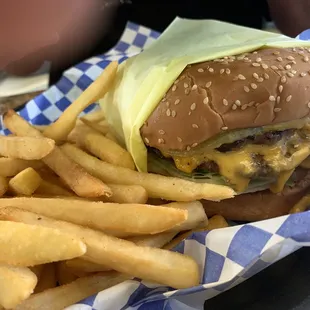 a cheeseburger and fries