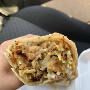 Breakfast burrito with gravy sauce