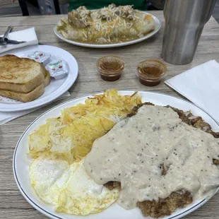 Chicken fried steak, eggs, hash browns  &amp; a Chile Verde breakfast burrito.