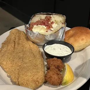 Catfish , baked potato, hush puppies