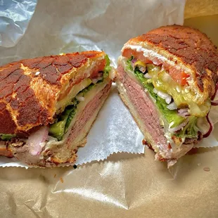 Roast Beef Sandwich on Dutch Crunch with everything on it, toasted.