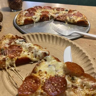 a slice of pepperoni pizza