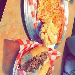 a sandwich and a slice of pizza