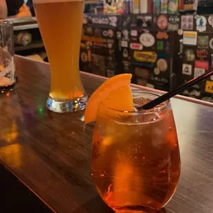 a drink and a glass of beer