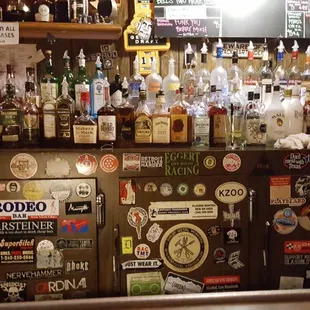 Interesting brewery stickers behind the bar