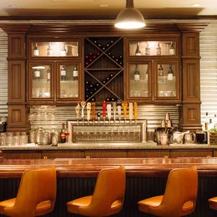 Sit up at the bar for a cool cocktail and a weekly happy hour