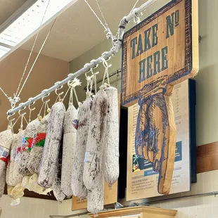 sausages hanging from hooks