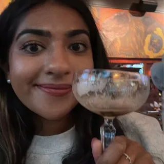 Rhea G.