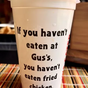a cup with a straw