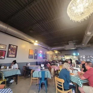 Interior, looking to the kitchen. Plenty of seating!