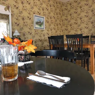 Keeping the historic rich ambiance of original wall paper and traditional decor offers many nice areas to gather.