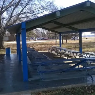 Shelter with picnic tables and grille