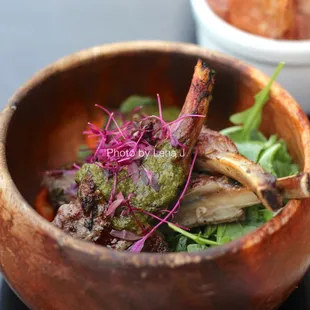 Chuletas de Cordero ($15) - grilled lamb chops, hazelnut &amp; almond romesco, mint salsa verde, arugula