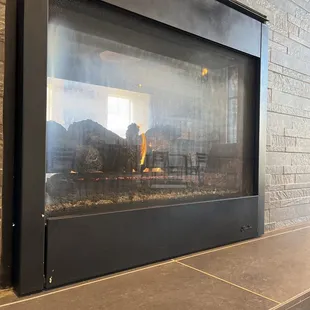 a fireplace in a coffee shop