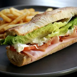 Ultimate Sub ... Prosciutto, Mortadella, Stracciatella, 'Nduja on a Paesana bread..