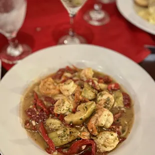 Shrimp pasta with artichoke, sun dried tomato and mushrooms