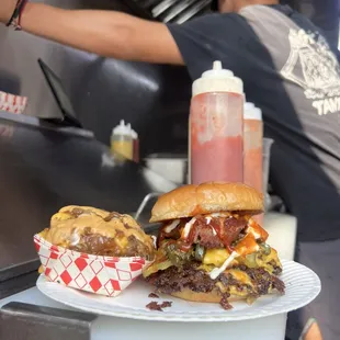 a man preparing a burger