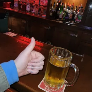 a person giving a thumbs up