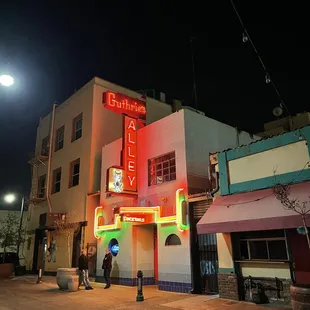 a neon sign on a building
