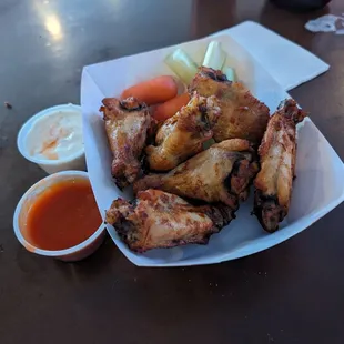 chicken wings and vegetables