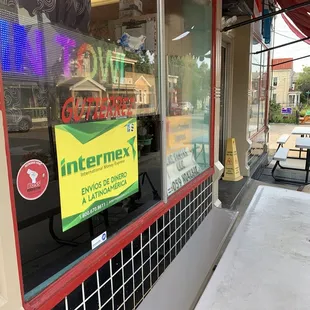 a sign in the window of a restaurant