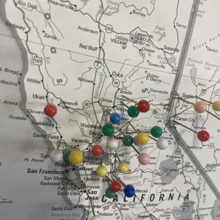 Visitors get to stick a pin in a big map to show where they come from!