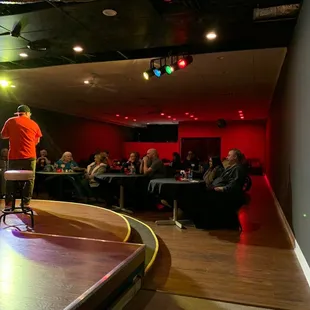a man on a skateboard in front of a crowd