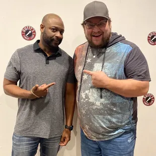 two men posing for a picture