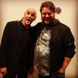 two men posing for a picture