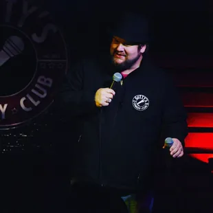 a man holding a microphone