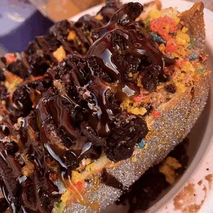 a chocolate covered dessert on a plate