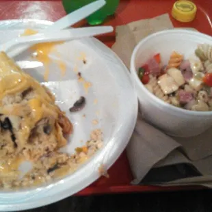 a plate of food and a bowl of salad