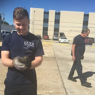 Getting a squirrel out from under my hood. They were definitely troopers and made sure the squirrel was ok.
